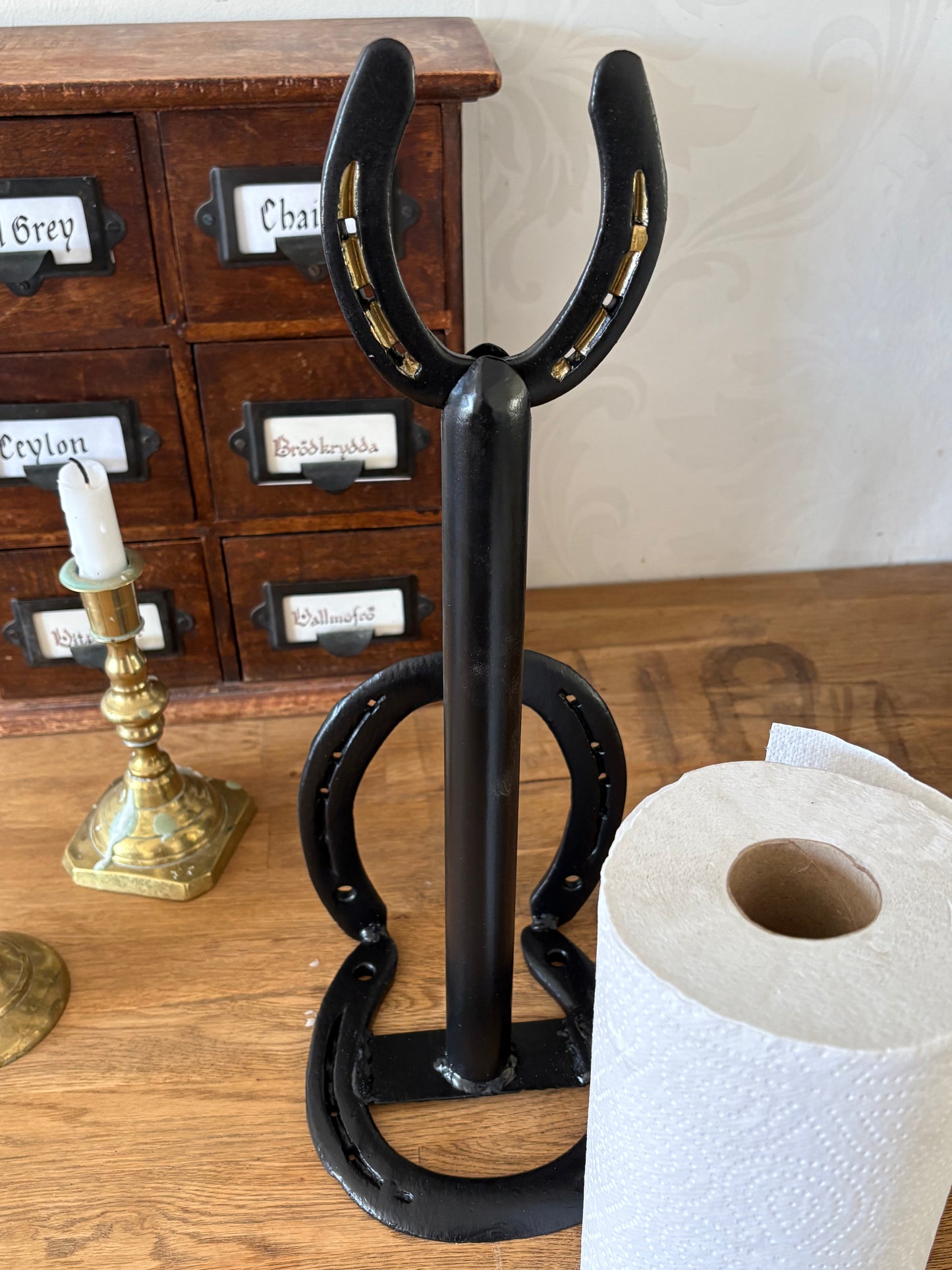 Hållare för hushållspapper